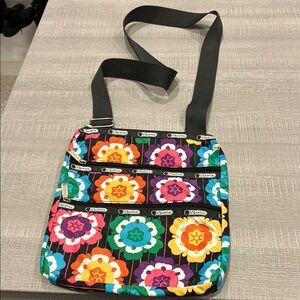 LEsports Colorful Floral Crossbody Bag. 3 compartments. Never used